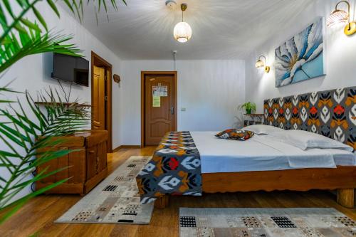 Postel nebo postele na pokoji v ubytování Popas Dumbravita