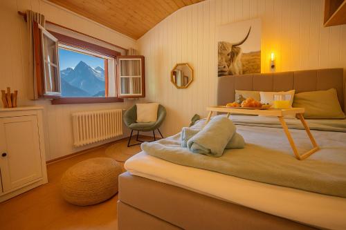 Ένα ή περισσότερα κρεβάτια σε δωμάτιο στο Studio avec sauna - 300m des pistes