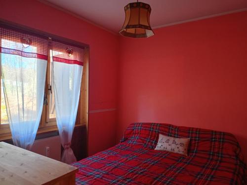 Postel nebo postele na pokoji v ubytování Fiocco di neve, residence Magnola