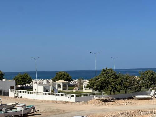 Galeriebild der Unterkunft Palm and wave in Ţīwī