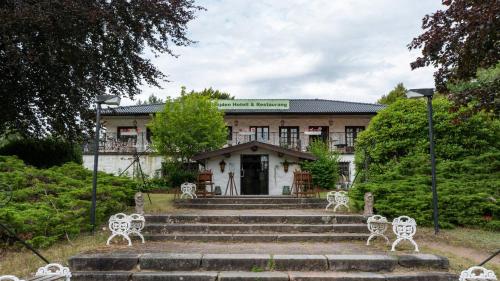 Κήπος έξω από το Tallhöjden hotel & Nature Lodge