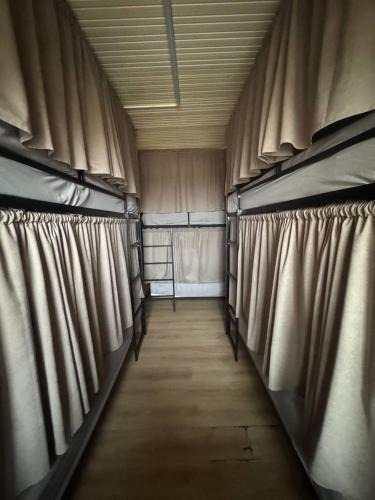 a row of curtains in a baseball field at Friends Hostel in Chişinău