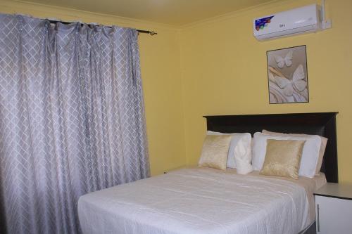 Ένα ή περισσότερα κρεβάτια σε δωμάτιο στο Blue Ridge Escape Guest House