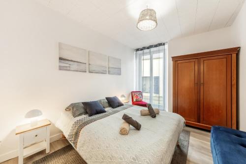 Postel nebo postele na pokoji v ubytování Maison de bourg