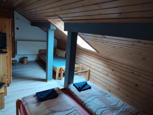 Giường trong phòng chung tại Ubytovanie V Súkromi