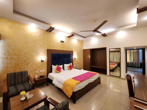 Postel nebo postele na pokoji v ubytování Grey Pelican Tourist Resort