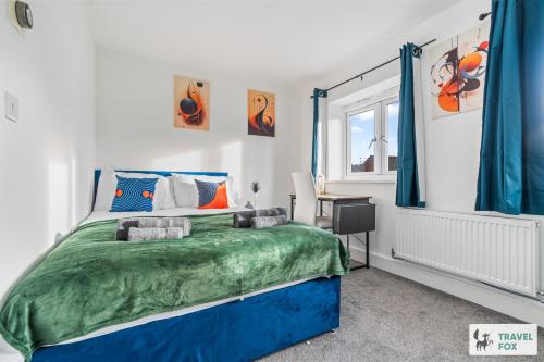 Ένα ή περισσότερα κρεβάτια σε δωμάτιο στο Heather's House