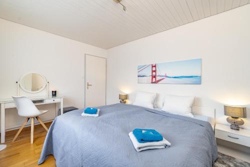 Ένα ή περισσότερα κρεβάτια σε δωμάτιο στο Aparthotel Mama Home Wildegg