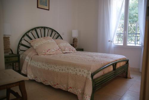 Ένα ή περισσότερα κρεβάτια σε δωμάτιο στο Luxueux appartement près du port