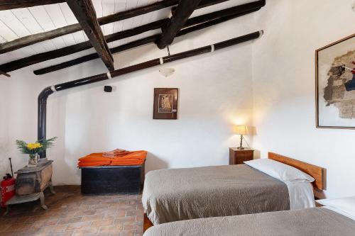 BerziThe Gallery - Unità 16的一间房间里有两张床的卧室