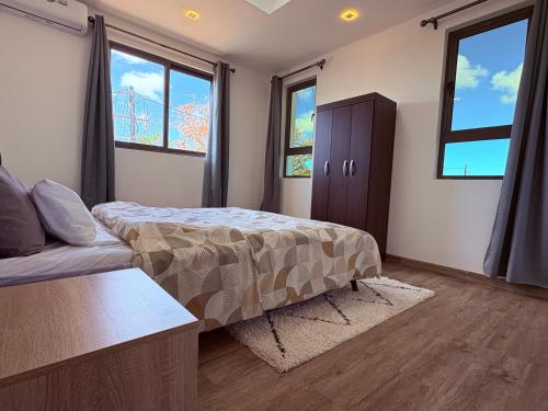 Postel nebo postele na pokoji v ubytování Cool Breeze VIlla No 1 Grand Baie