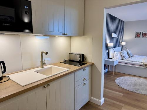 Kuchyň nebo kuchyňský kout v ubytování Salzwasser