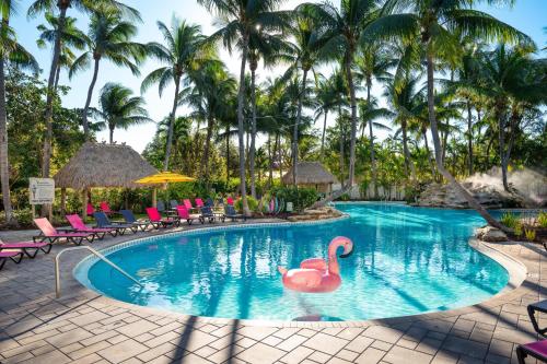 a swimming pool with a pink flamingo in a resort at Havana Cabana at Key West in Key West