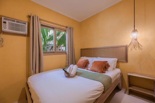 Postel nebo postele na pokoji v ubytování Terracotta House