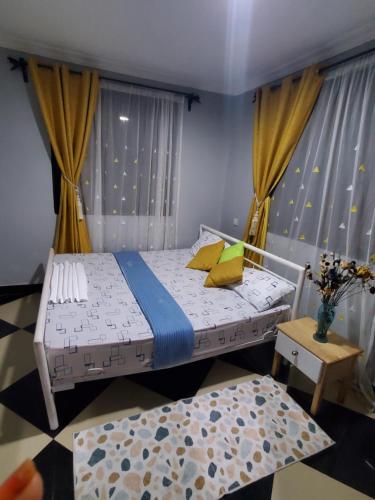 Postel nebo postele na pokoji v ubytování divine favour homestay