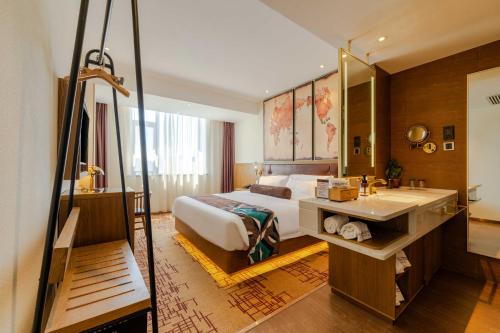 Ένα ή περισσότερα κρεβάτια σε δωμάτιο στο James Joyce Coffetel Beijing Yizhuang Development Zone Yicheng Times Square