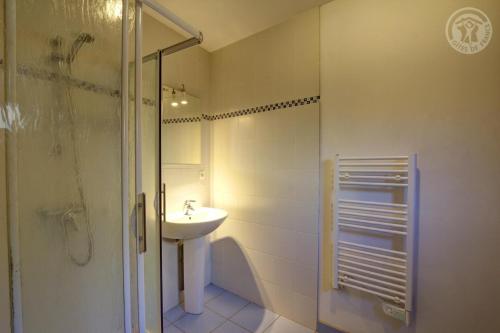 Koupelna v ubytování Le poulailler
