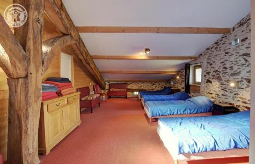 Postel nebo postele na pokoji v ubytování Le poulailler