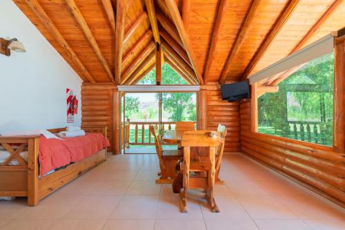 Postel nebo postele na pokoji v ubytování Cabañas Posada del Angel