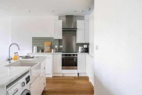 Køkken eller tekøkken på Seven Space - The City Haven