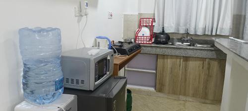 Kuchyň nebo kuchyňský kout v ubytování Serene Homes-Membley