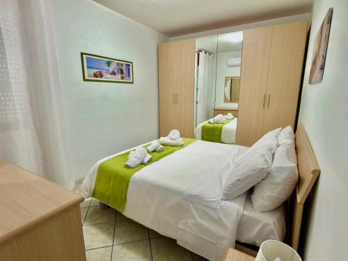 Ένα ή περισσότερα κρεβάτια σε δωμάτιο στο BelHome