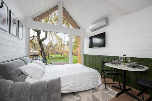 Postel nebo postele na pokoji v ubytování Private small house with sauna and terrace