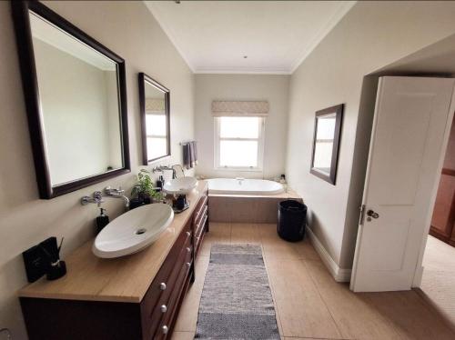 Postel nebo postele na pokoji v ubytování Peaches Property