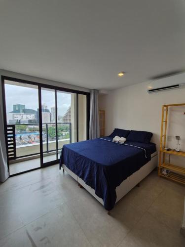 Postel nebo postele na pokoji v ubytování Studio A7-B Vista Incrível com piscina