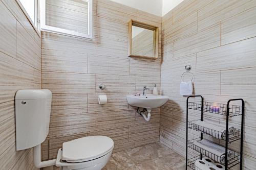 Koupelna v ubytování House Komadic raja