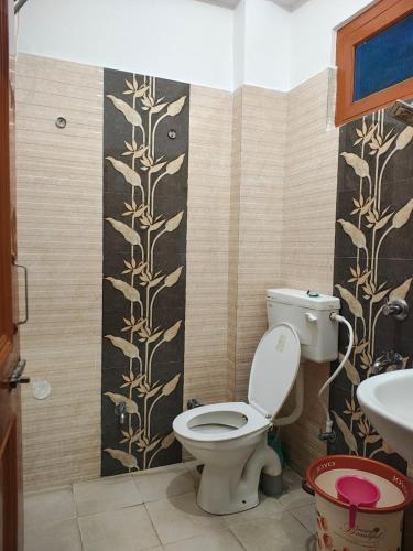 Ένα μπάνιο στο Hotel krishna and Restaurant