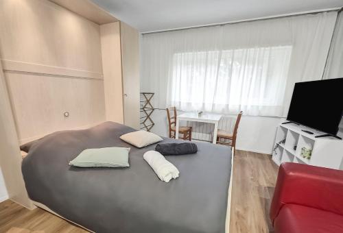 Postel nebo postele na pokoji v ubytování Studio affaires et détente proche Nantes