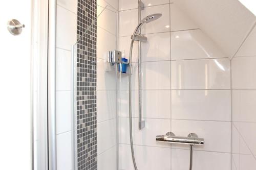 Ένα μπάνιο στο Ferienwohnung Hartmann Medebach