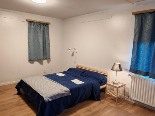 Ένα ή περισσότερα κρεβάτια σε δωμάτιο στο Room in Keflavík