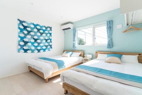 Postel nebo postele na pokoji v ubytování Grandioso Okinawa Villa Kin 2 - Vacation STAY 63972v