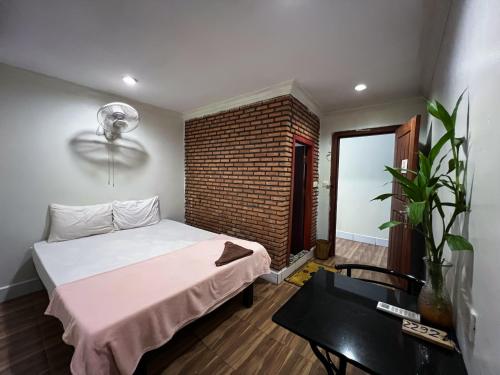 Postel nebo postele na pokoji v ubytování Moon Ratanak