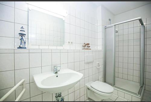 Et badeværelse på Schatzkiste mit Meerblick