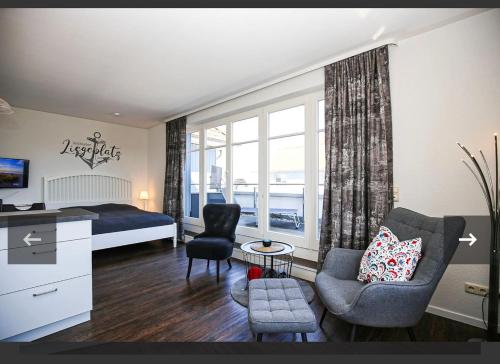 En eller flere senge i et værelse på Schatzkiste mit Meerblick