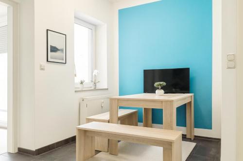 Μια τηλεόραση ή/και κέντρο ψυχαγωγίας στο SUNNYHOME Monteurwohnungen und Apartments in Weiden