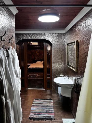 Koupelna v ubytování Hotel Style BESSARABIA