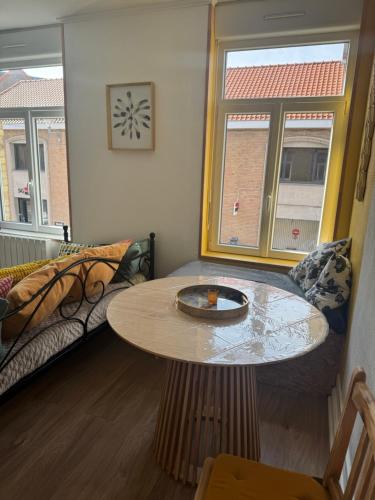 Ein Sitzbereich in der Unterkunft La Gravelinoise 2