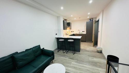 Ein Sitzbereich in der Unterkunft Preston City centre Winckley Square Flat