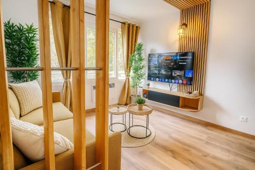 Μια τηλεόραση ή/και κέντρο ψυχαγωγίας στο Studio lumineux et élégant au cœur de Lille