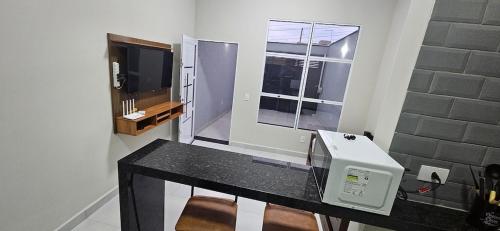 Køkken eller tekøkken på Casa Completa com 2 Quartos Conforto e Espaço