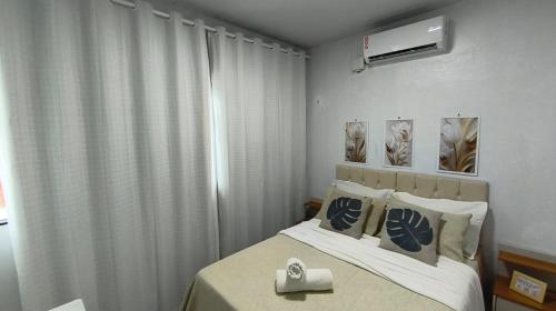 Postel nebo postele na pokoji v ubytování Quarto 1 próximo ao Aeroporto Internacional