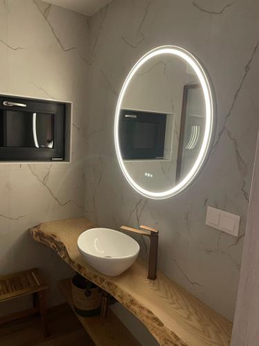 a bathroom with a sink and a mirror at Witam Karpacz 2 in Karpacz