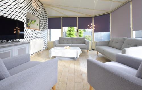 Posezení v ubytování Maison Cosy Proche Mer