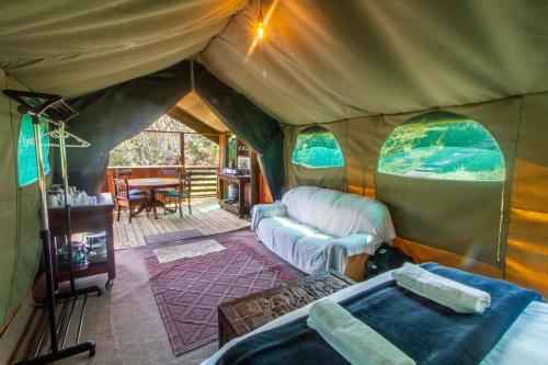 Ένα ή περισσότερα κρεβάτια σε δωμάτιο στο Wilderness Glamping Tents