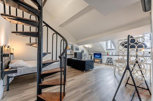 a loft apartment with a bunk bed and a staircase at Historic Palace Duplex - Cruises 2min - AC - WiFi in Savona