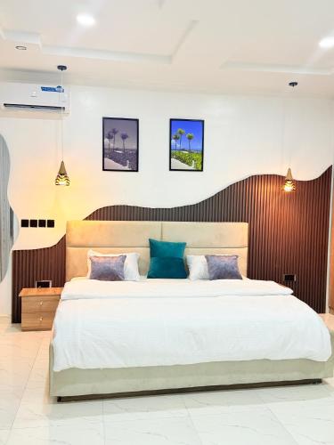 Ένα ή περισσότερα κρεβάτια σε δωμάτιο στο Merakie Homes